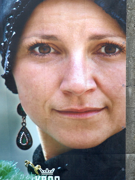 Leading lady of a forthcoming attraction. The image is that of a poster measuring about 5m x 2m and was hanging at the entrance to the castle. 