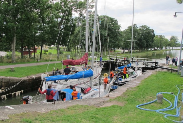 Yachts passing through one of the fifty-eight locks on the Gota Canal.