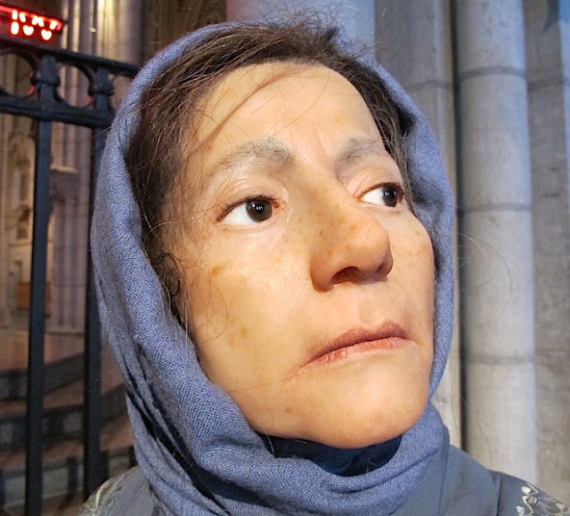 Enlarge this image and look deep into the Virgin Mary’s face. 