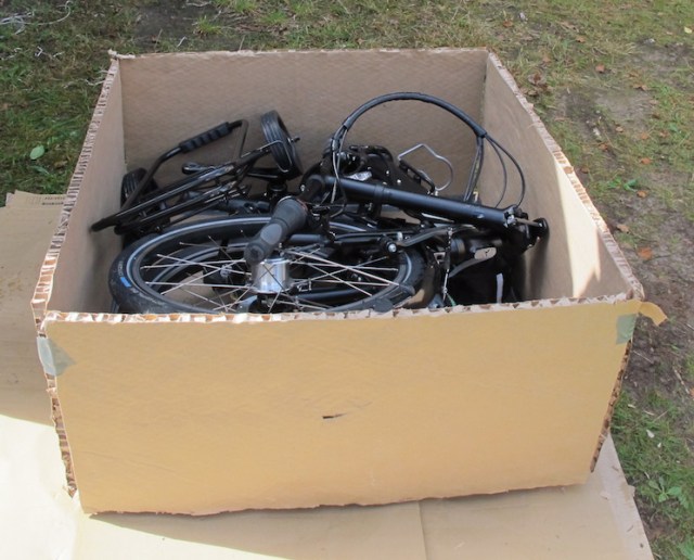 The fabricated cardboard box. 