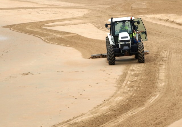 Any rubbish washed ashore along the beaches of Santander is soon gathered up by the beach sweepers.