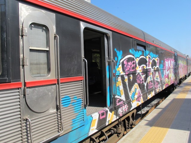Graffiti on the windows of the train to Tavira.