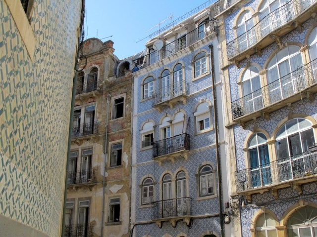 Three tiled apartments buildings. 