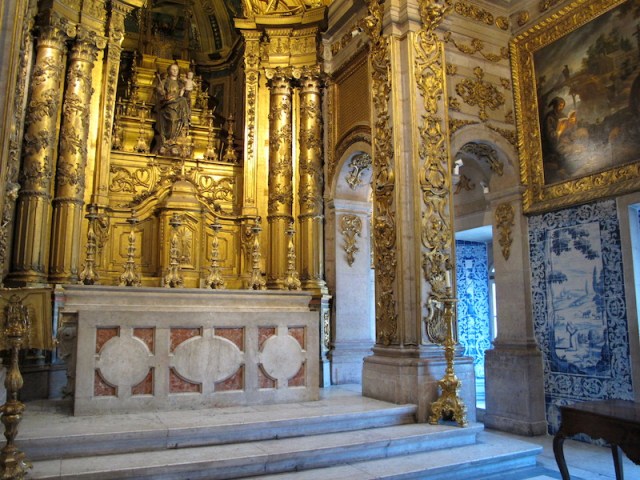 The altar is decorated with gold leaf, not gold paint.