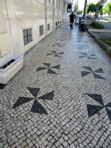 The footpath, outside the hostel where we are staying. Bev riding the footpath.