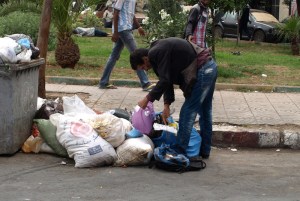 A desperate man looking for food.
