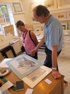  Laurence explaining to Bev the difference between a lithograph and a woodcut. 