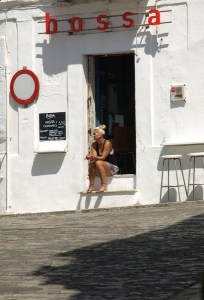 Enjoying the sun and waiting for a customer.