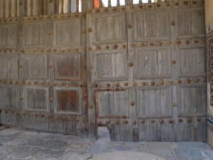 The doorway relating to the previous photograph. Note the cat hole at the bottom left of the right door.