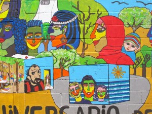 Part of a colourful wall painting. 