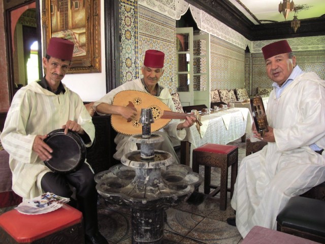  The drummer on the left had a particularly interesting face.