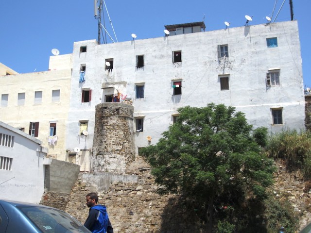One of the newer apartments has cunningly utilised an old wall tower as a balcony. 