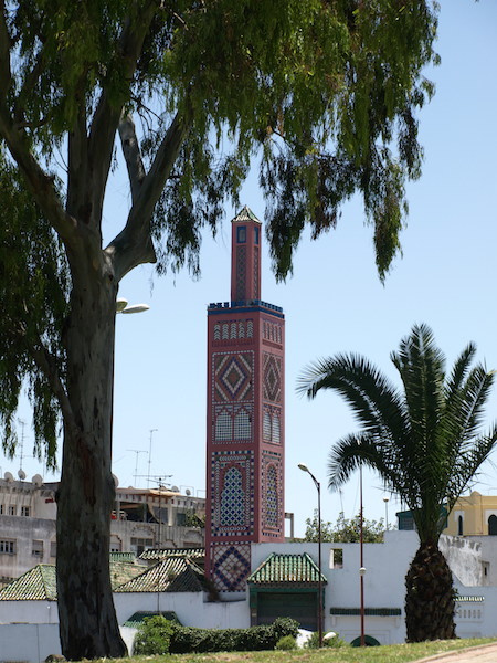 The principal centrepiece of the Grand Socco is the tiled Grand Mosque tower.