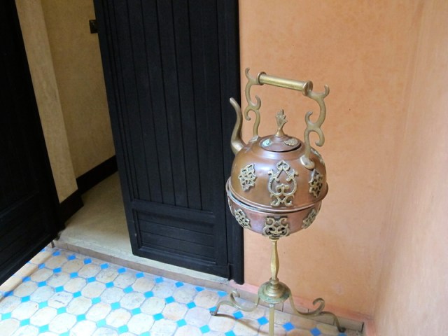 Ornate teapot pointing at our bedroom door. 
