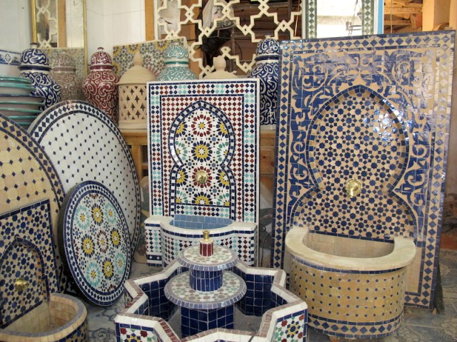 A showroom for tiled tabletops and water fountains. 