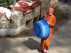 Moving to the carpet washing area by the river. 