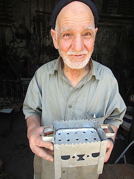 The tinsmith who made small charcoal burning stoves. 