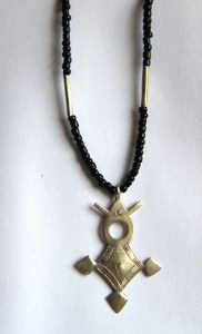 The Tuareg Agadez or Southern Cross with glass beads.