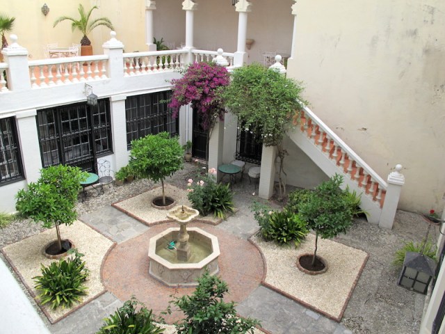 The attractive garden of the Legation. 