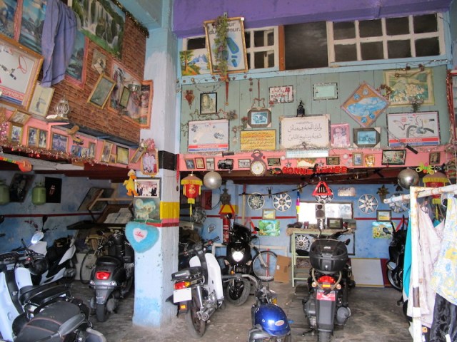 The interior of the motorcycle mechanic’s workshop. Quite a menagerie really.