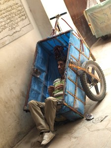 Delivery man waiting for a call to his next job. 