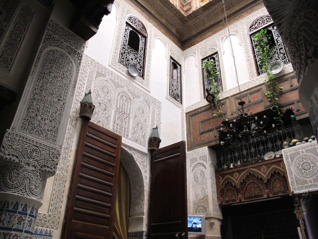 Our bathroom window is directly above the tall wooden door (where the dish is hanging from the sill). 