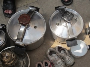 Pressure cookers along with other bits and bobs for sale in the Fez market. 