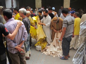 Feeling the quality of the finished skins. 