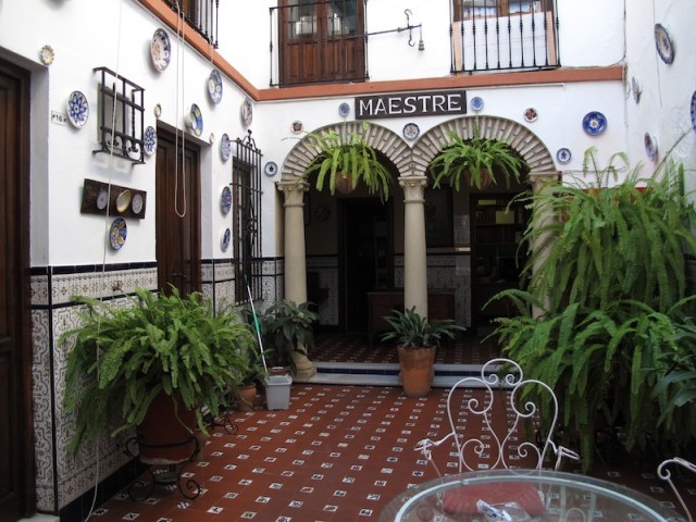 The courtyard of the nearby Hostel Maestre, a former family home.
