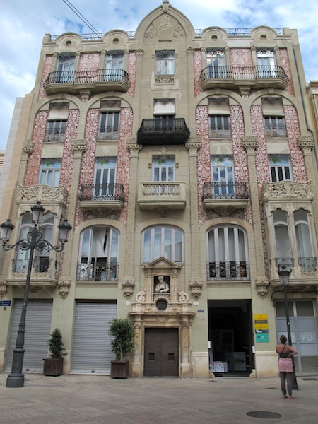 Creative false arch facade of a building somewhere in Valencia. 