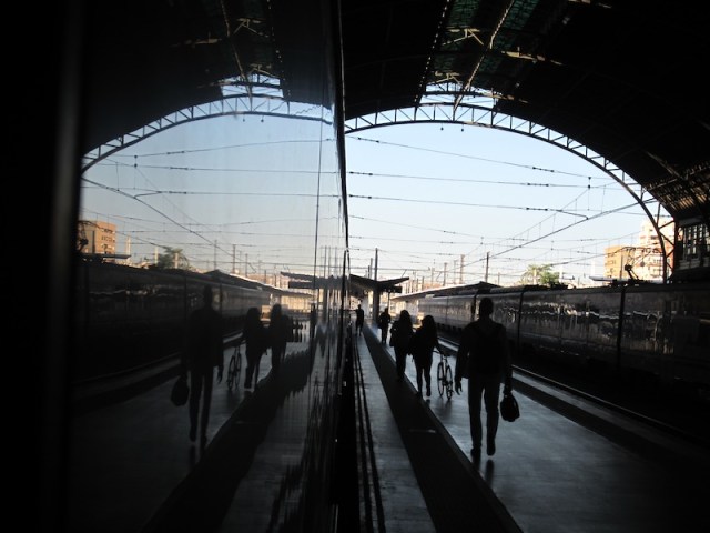 A reflection in the side of the train at Valencia Railway Station the morning we left for Barcelona. 