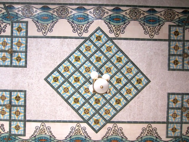 The tiled ceiling of a room off the main hall. 