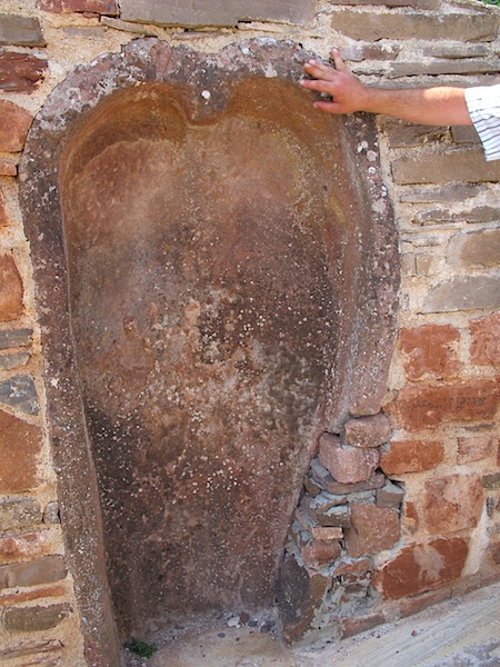 Another Sebastian collectible, a double stone coffin set in a retaining wall 