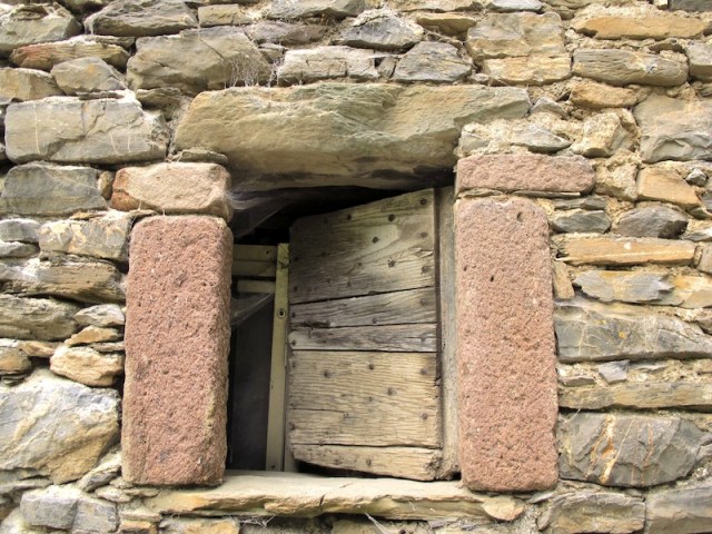 Beautiful window in the barn with hand hewn jambs.