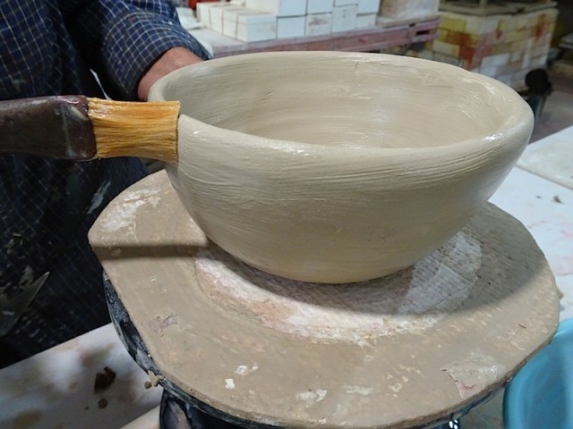 Cleaning up the coil pot. 