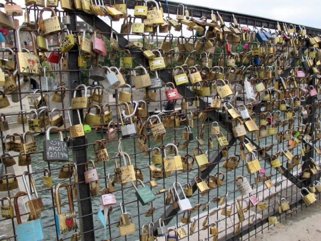 Love locks on one of the thirty seven bridges over the River Seine. 
