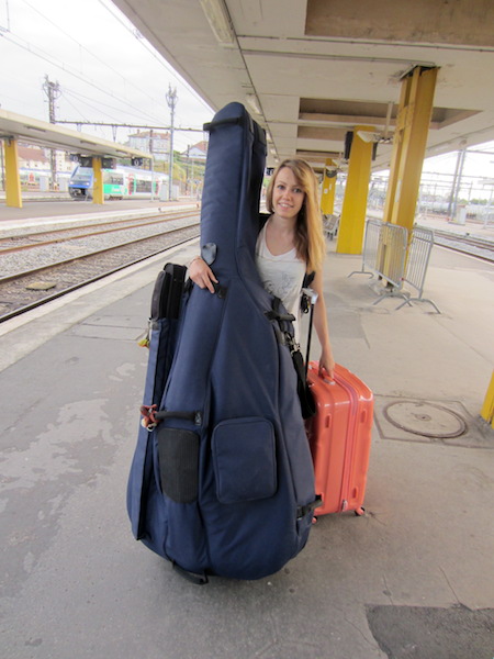 A musician and her double bass shared space with our bikes. 