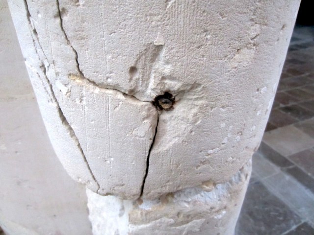 Projectile embedded in a column, a remnant of ‘The Raid’. 